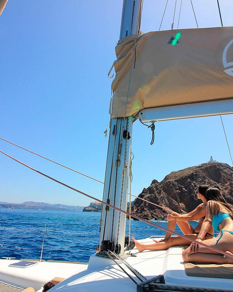 Friends on Catamaran Boat Trip in Santorini
