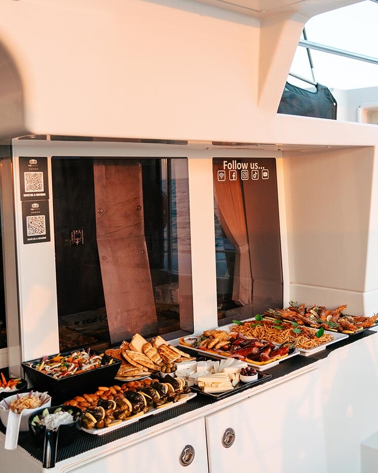 Food buffet on catamaran in Santorini Island