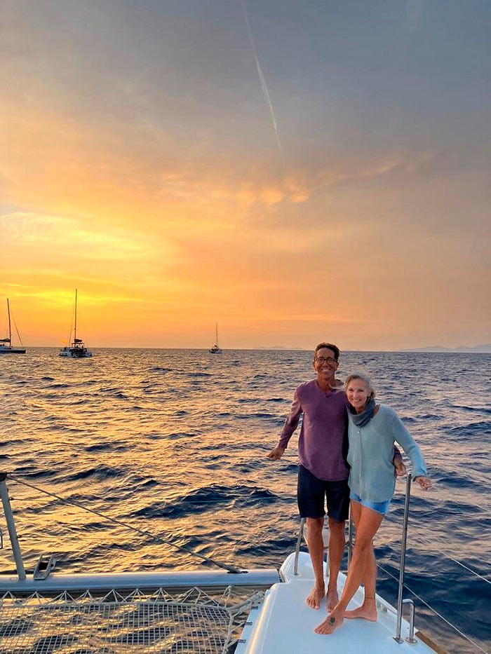 Couple enjoying a Santorini Sunset Cruise